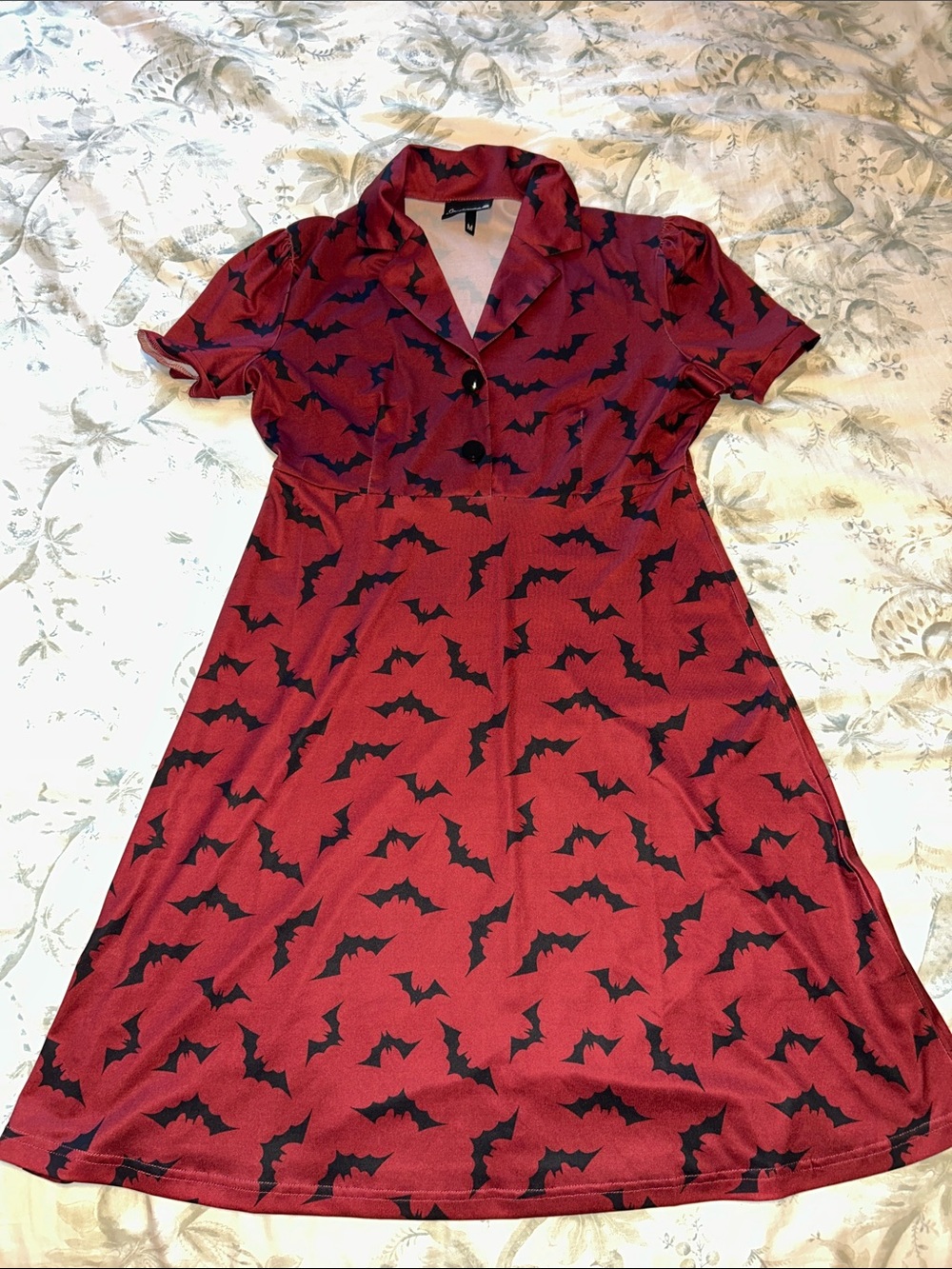 Sourpuss dress, size medium